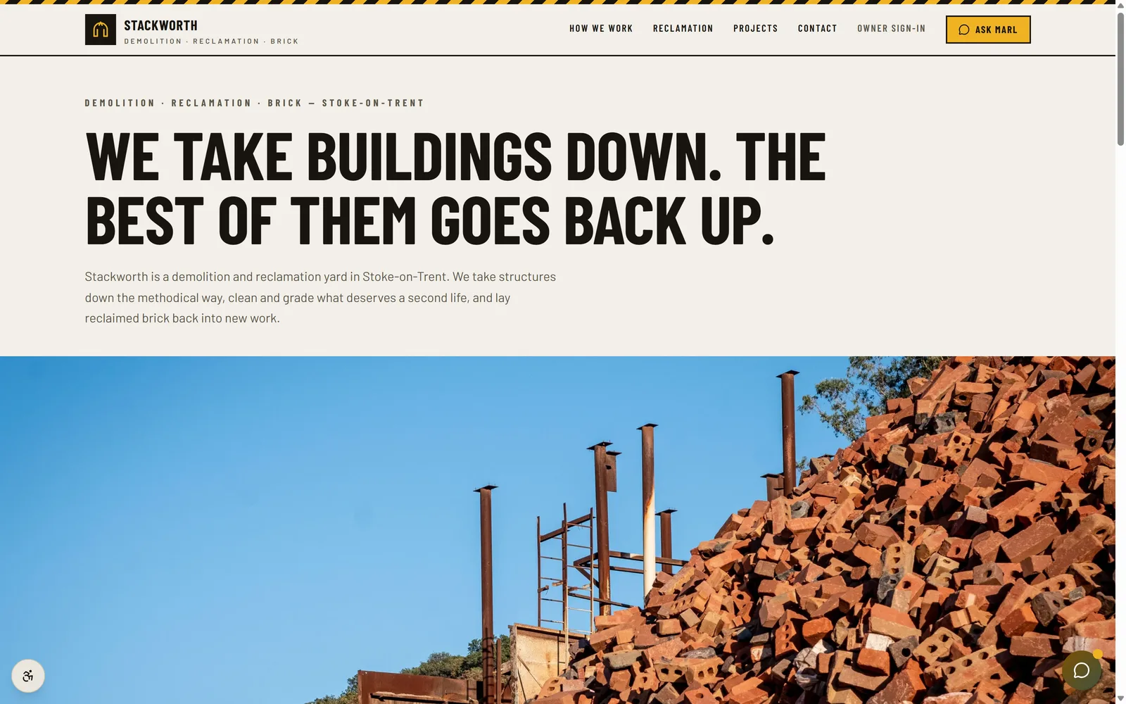 The Stackworth demo homepage: a condensed uppercase headline over a reclamation yard's brick mountain, above the Take-Down Reckoner's banded figures