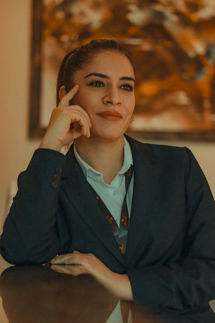 An estate agent at her desk — illustrative.