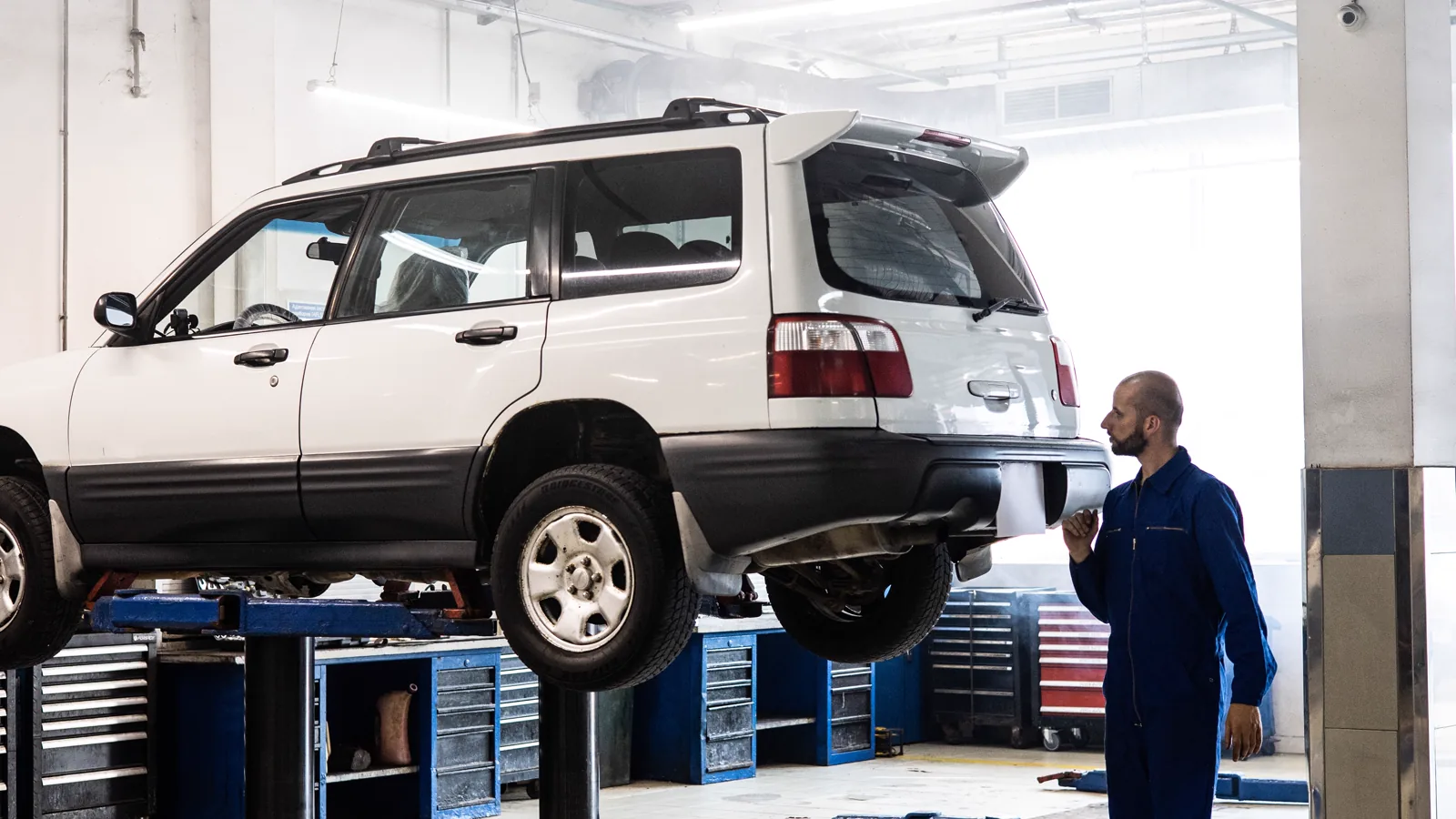 Vehicle inside a workshop bay