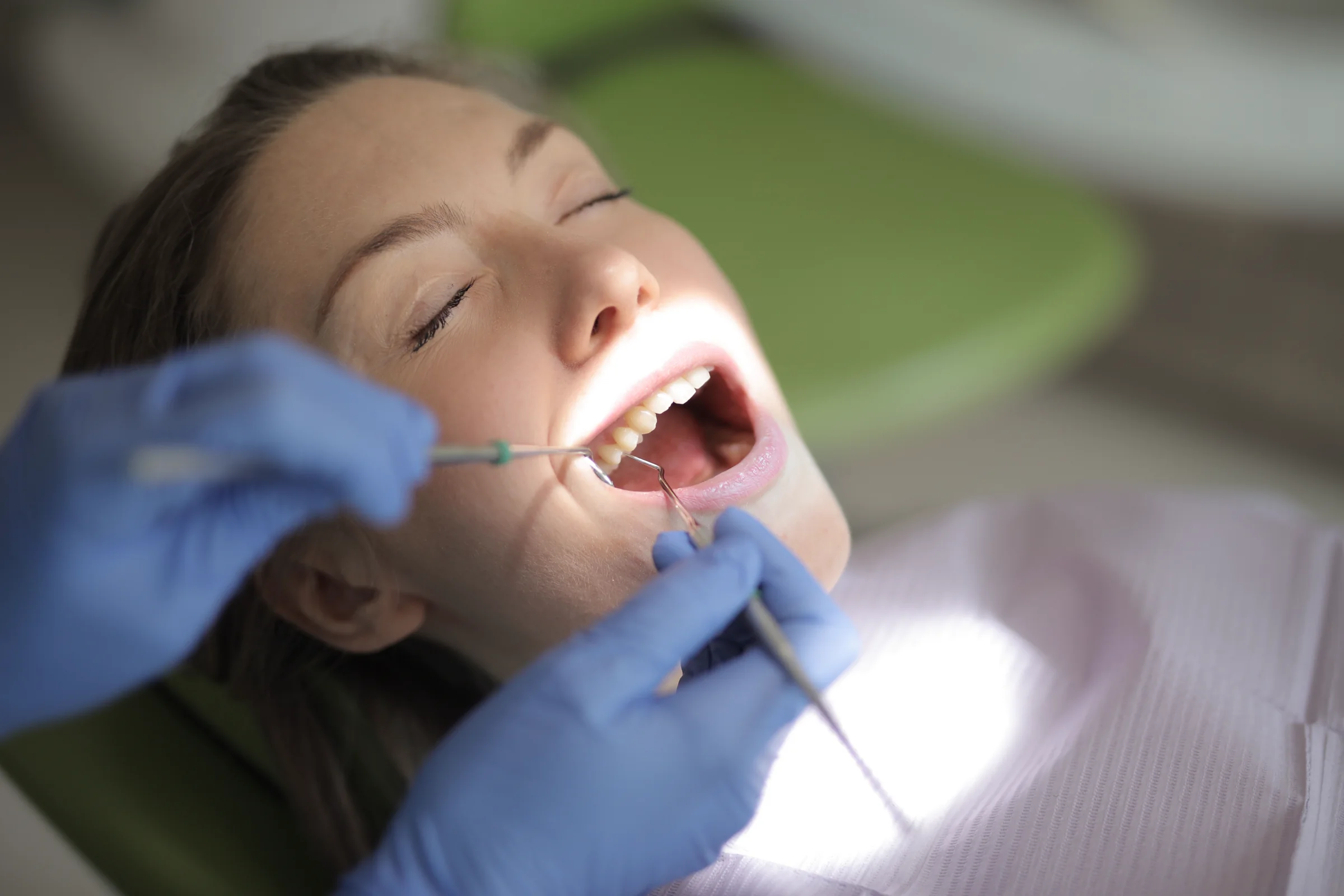 Dentist speaking with a patient